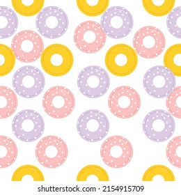 seamless background with donuts vector illustration