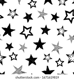 Seamless background of doodle stars. Black hand drawn stars on white background. Vector illustration