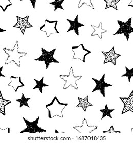 Seamless background of doodle stars. Black hand drawn stars on white background. Vector illustration