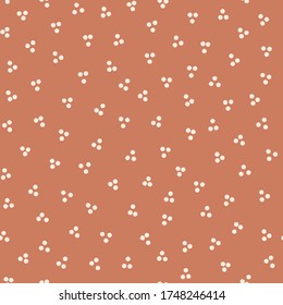 Seamless background dotted  gender neutral baby pattern. Simple whimsical minimal earthy 2 tone color. Kids nursery wallpaper or boho spotted fashion all over print.