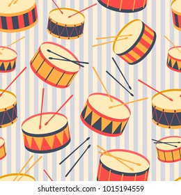 Seamless background with drums and drum sticks. Vector illustration. Pattern. Flat.