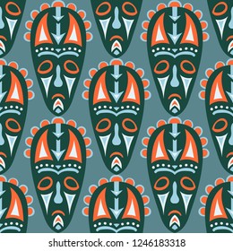 Seamless Background. Ethnic Seamless Pattern with Color Masks for Print or Card. Ethnic Seamless Pattern with Color Trible Shamanic Masks for your Design. Vector Texture.