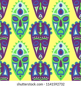 Seamless Background. Ethnic Seamless Background with Ritual Masks for Print or Card. Ethnic Seamless Pattern with Color Trible Shamanic Masks for your Design. Vector Texture.