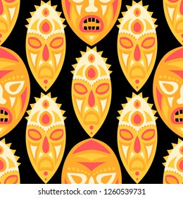 Seamless Background. Ethnic Seamless Background with Ritual Masks for Textile or Paper. Ethnic Seamless Background with Color Trible Ritual Masks for your Design. Vector Texture.