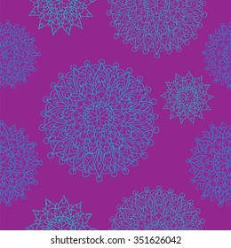 Seamless background in ethnic style with delicate mandalas