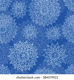 Seamless background in ethnic style with delicate mandalas