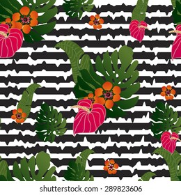 Seamless background  exotic with tropical leaves end with tropical flowers