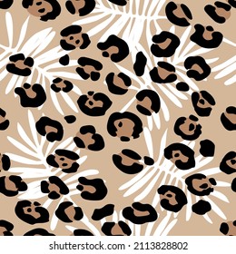 Seamless background from Fashionable exotic pattern with leopard skin and palm leaves. Artistic collage of botanical and animal drawing. template for fabric design, cover, wallpaper.