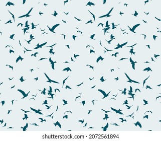 A seamless background with flight of birds.