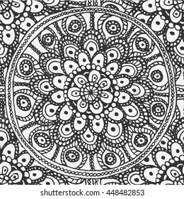 Seamless background from floral round black and white hand-painted mandala coloring, consisting of many parts.