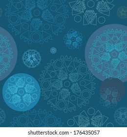 Seamless background with flowers made of geometric shapes