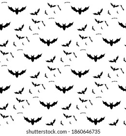 Seamless background with flying bats. Traditional Halloween symbols. Seamless halloween background with black bats. Flat style on a white background. Vector illustration