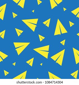 Seamless background with folded aircraft. On the blue background are paper-folded planes of various sizes, flying in all directions.