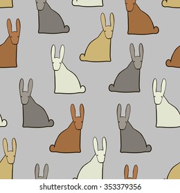 Seamless background with funny colorful hares, vector 