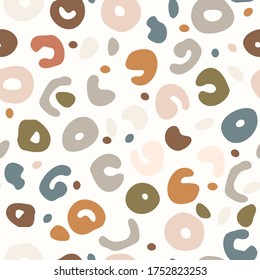 
Seamless background gender neutral baby dotted pattern. Simple whimsical minimal earthy 2 tone color. Kids nursery wallpaper or boho spotted fashion all over print.