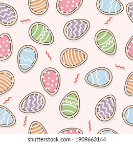 Seamless background with gingerbread cakes in the shape of Easter eggs in soft pastel tones