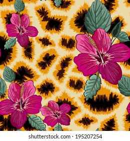 Seamless background with giraffe skin and hibiscus flowers