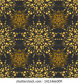Seamless background with golden points on the dark gray background. Endless texture for design. Decorative seamless pattern for greeting cards, decorating interiors, cosmetics and textile.