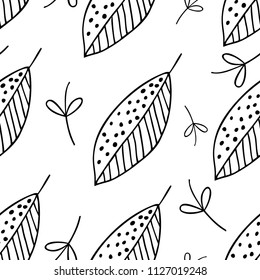 seamless background from graphic white and black flowers and leaves