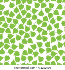 Seamless background of green birch leaves