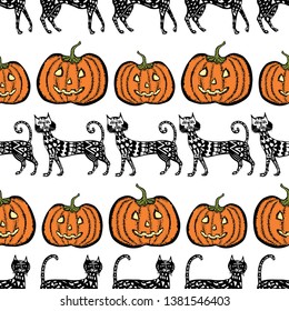 Seamless background of halloween cats and pumpkins