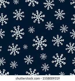 Seamless background of hand drawn snowflakes. Blue snowflakes on dark blue background. Christmas and New Year decoration elements. Vector illustration.