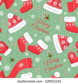 Seamless background with hats, mittens, Christmas socks, candy and snowflakes.