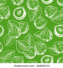 seamless background with hazelnuts and leaves. hand-drawn illustration
