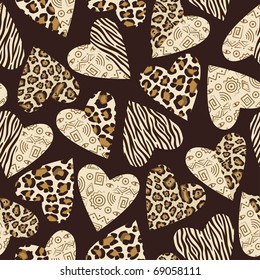 Seamless background with hearts with animal skin pattern.