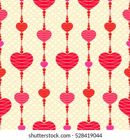 Seamless background of hearts and beads on the tapes.