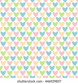 Seamless background of hearts of different colors. Great for birthday, baby shower celebration greeting and invitation card. Mother's Day, Easter, wedding, scrapbook, gift wrapping paper, web banner.
