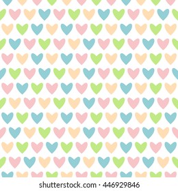Seamless background of hearts of different colors. Great for birthday, baby shower celebration greeting and invitation card. Mother's Day, Easter, wedding, scrapbook, gift wrapping paper, web banner.