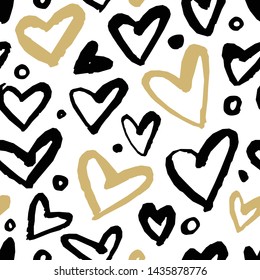 Seamless background with hearts of gold and black. Hand-drawn ink.