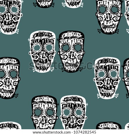 Seamless background of the horrendous masks