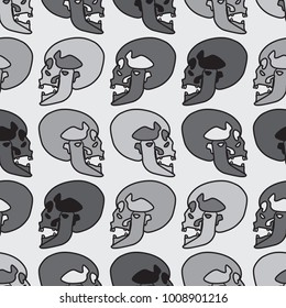 Seamless background with human skulls