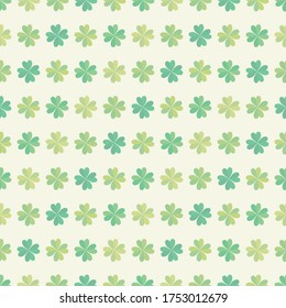 Seamless background with illustration of four-leaf clover, symbol of good luck.
