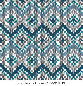 Seamless background with imitation of a knitted sweater. Simple geometric pattern in winter theme. Sample and template of knitted article. Vector illustration. Ornament shapes. Blue threads.