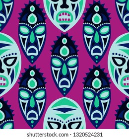 Seamless Background. Indian Seamless Pattern with Color Masks for Poster or Banner. Ethnic Seamless Pattern with Color Trible Shamanic Masks for your Design. Vector Texture.