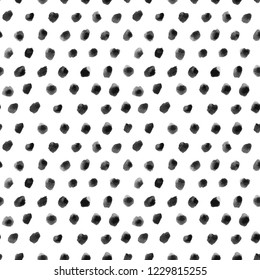 Seamless background with ink dots texture.