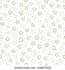 Seamless background with irregular dots, spots and circles. Dry brush and ink pattern.
