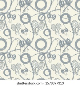 Seamless background. Jewelry chain and bow gray-blue color with a fashionable pattern . Wallpaper, fabric, packaging