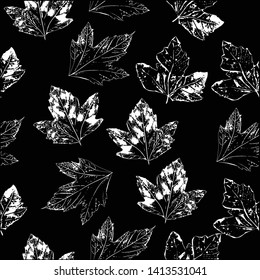 Seamless background. Leaf prints on black background. Template for textile design, interior design, wallpapers and banners. Background for your design. Black prints of leaves on a white background.
