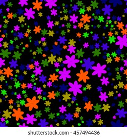 Seamless background with little colored flowers. Vector
