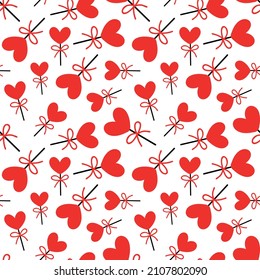 Seamless background with lollipops on a stick in the shape of a heart. pattern on valentines day. Vector illustration