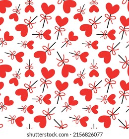 Seamless background with lollipops on a stick in the shape of a heart. pattern on valentines day. Vector illustration