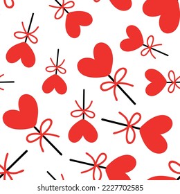 Seamless background with lollipops on a stick in the shape of a heart. pattern on valentines day. Vector illustration