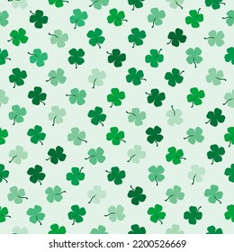 Seamless background with lucky clovers