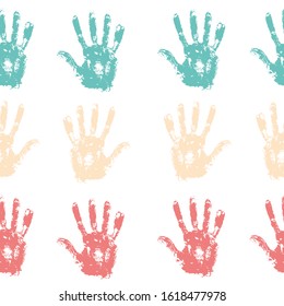 Seamless background made from colored handprints. Vector illustration. Multicolor backdrop for your design.