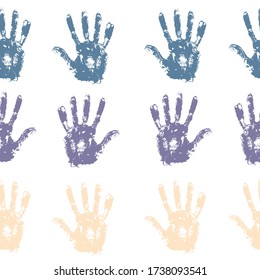 Seamless background made from colored handprints. Endless pattern with multiply effect. colored hand prints on white background