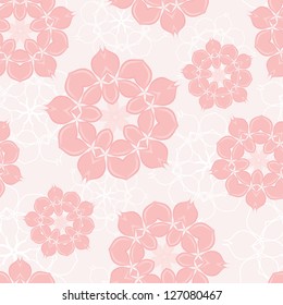 Seamless background made of pink blossoms.